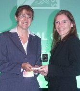 Lisa Vickers receving Prowess Flagship Award from Anne Crisp, NatWest